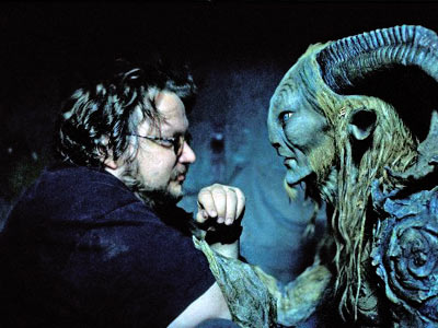 Guillermo del Toro and the faun from Pan's Labyrinth.